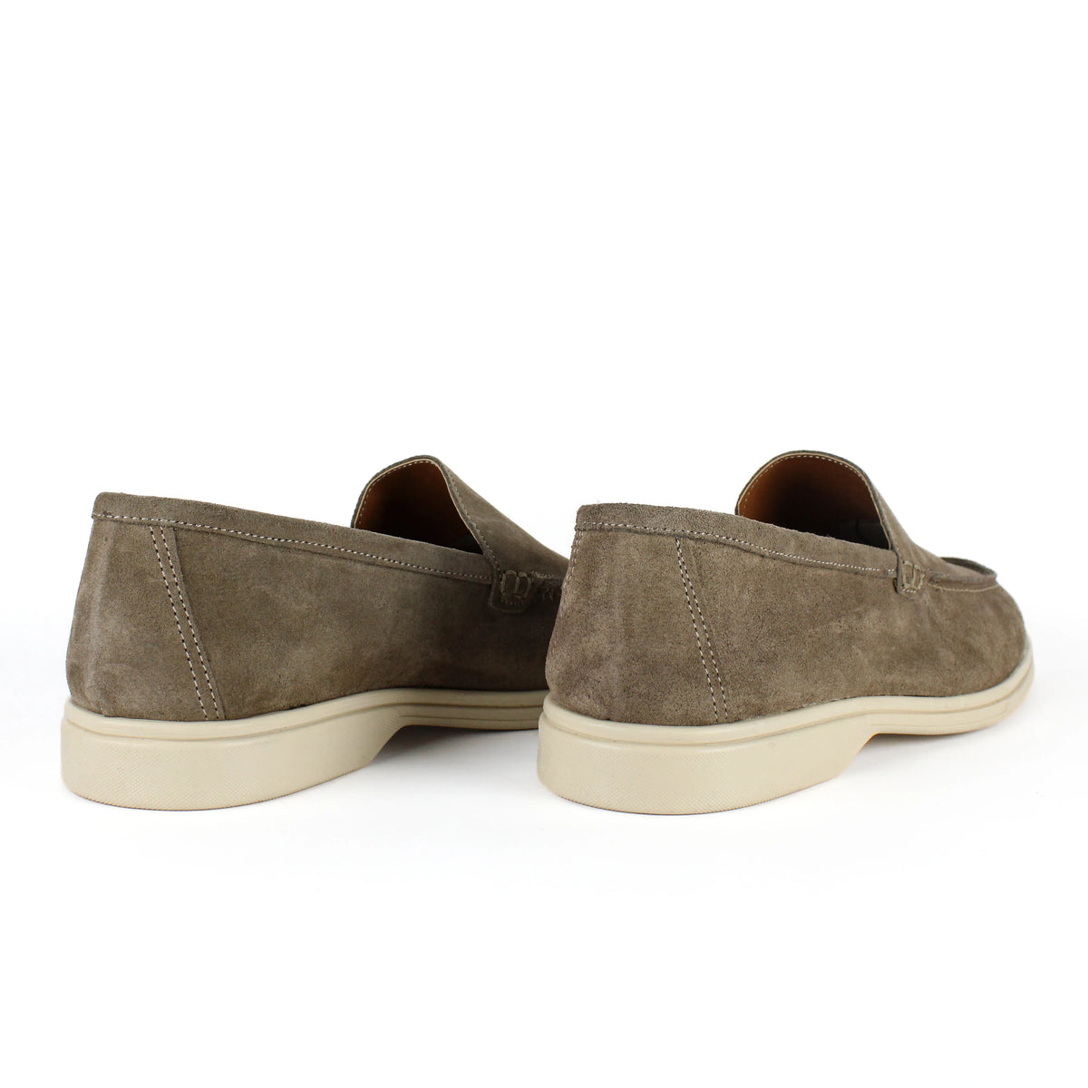 Men's beige slip-on loafers with moc toe stitching and cream soles