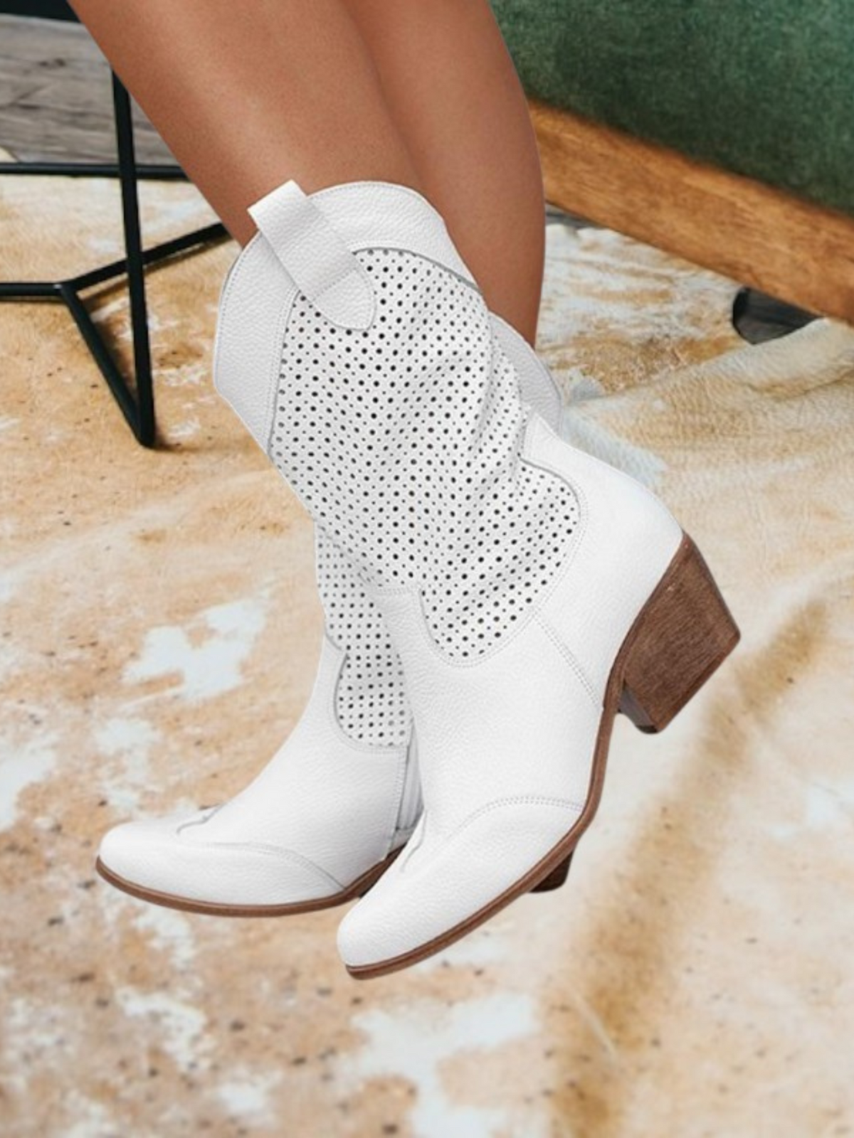 Women's western boots with pointed toes, perforated panels and low block heels