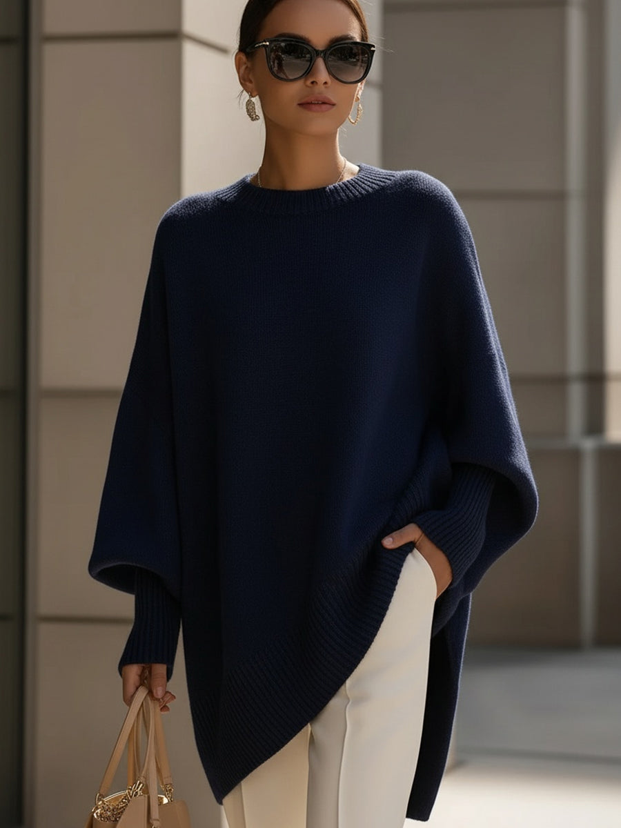 Women's oversized plain crew neck sweater with long sleeves and asymmetric hem