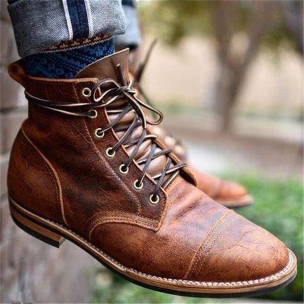 Men's brown lace-up ankle boots with stitched cap-toe detail and low heel