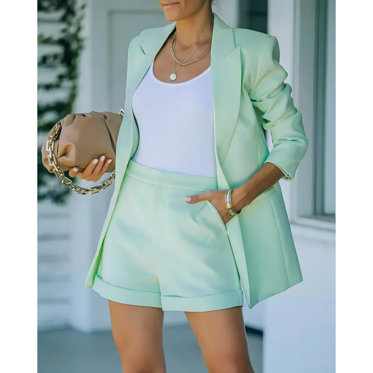 Women's blazer and shorts set with notch lapels and long sleeves