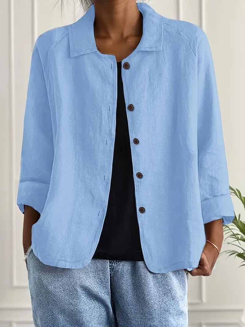 Women's button front collared jacket with long sleeves and rounded hem