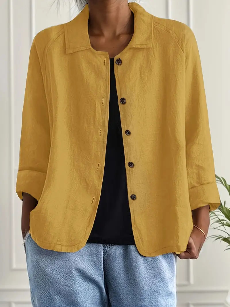 Women's button front collared jacket with long sleeves and rounded hem