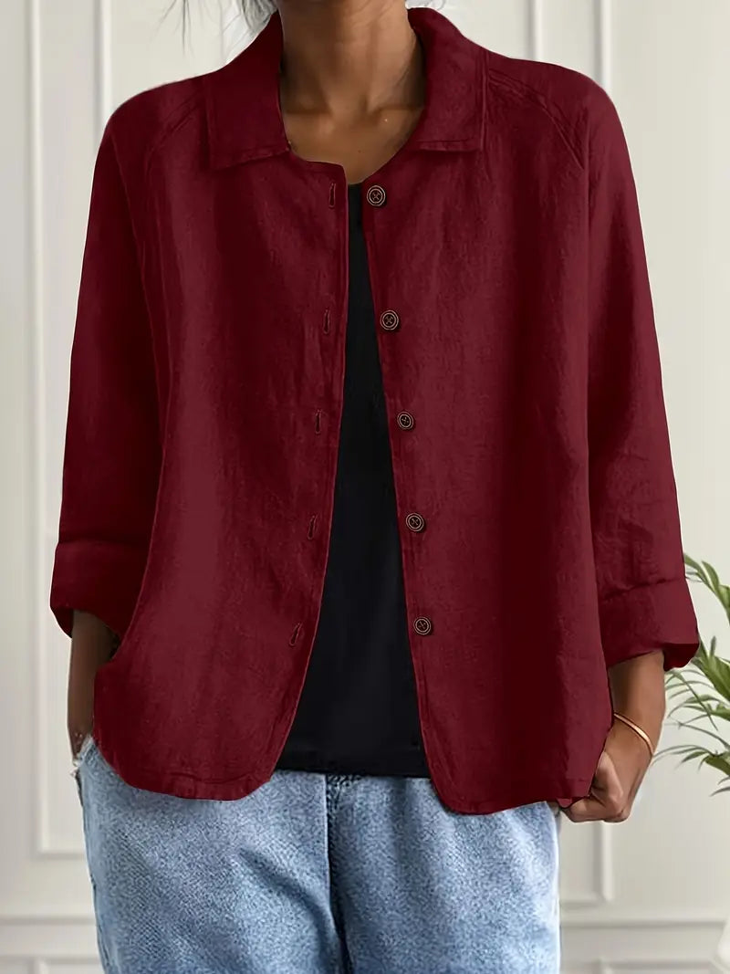 Women's button front collared jacket with long sleeves and rounded hem