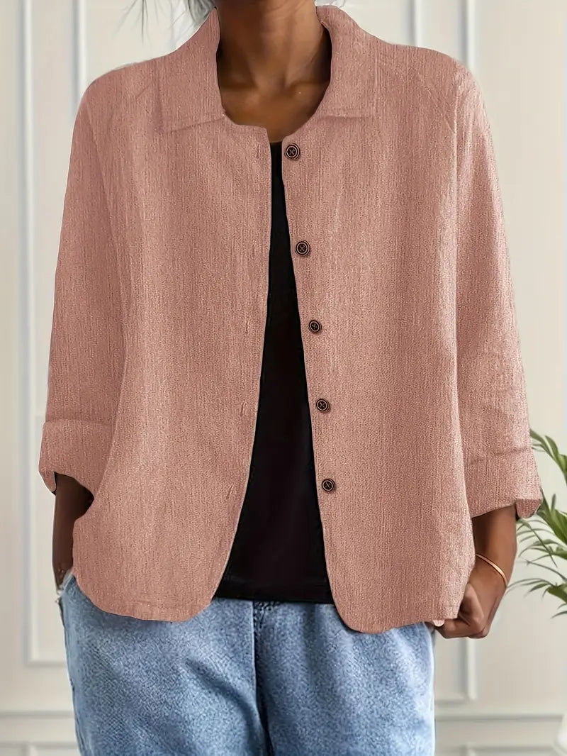 Women's button front collared jacket with long sleeves and rounded hem