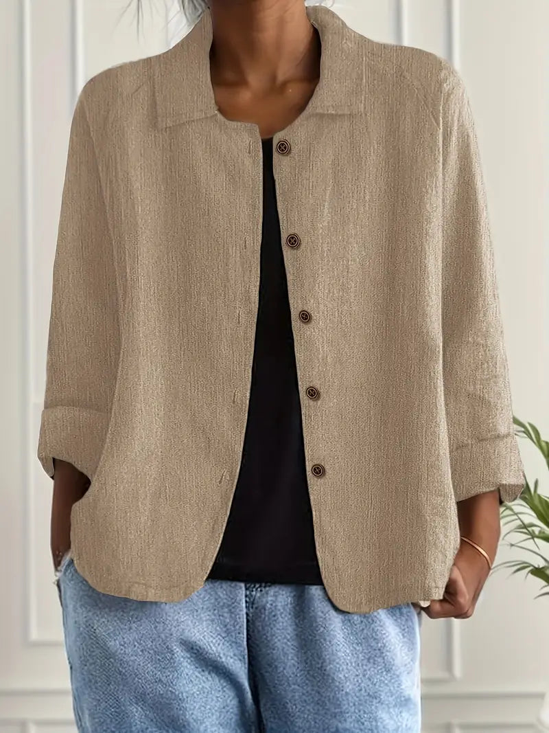 Women's button front collared jacket with long sleeves and rounded hem