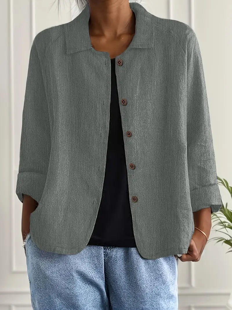 Women's button front collared jacket with long sleeves and rounded hem