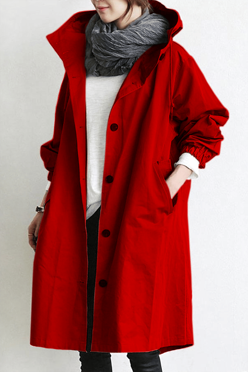Women's hooded button-front trench coat with long sleeves and side pockets