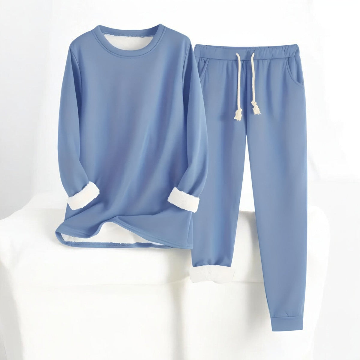 Two-piece crew neck sweatshirt and jogger set with contrasting white cuffs and drawstring trousers