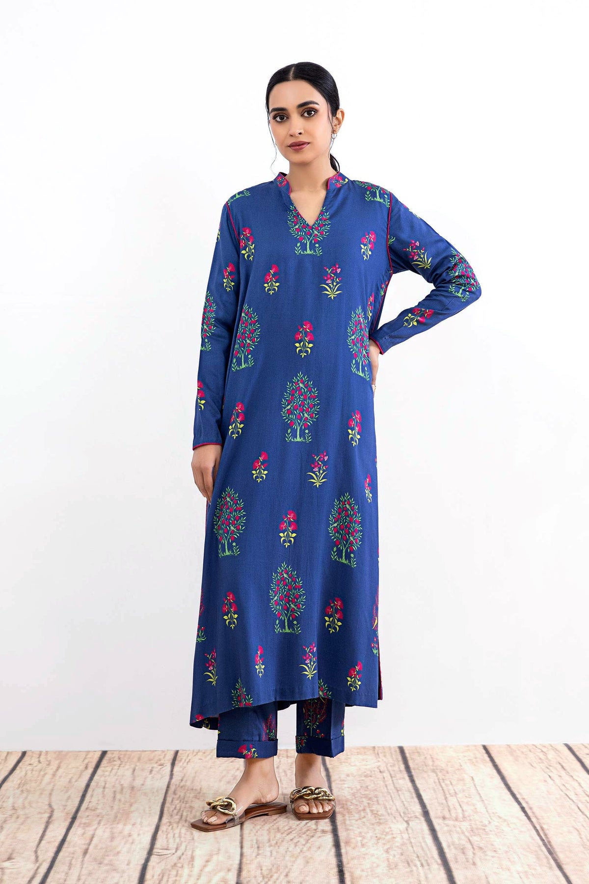 Women's blue floral two-piece suit with long tunic and matching trousers