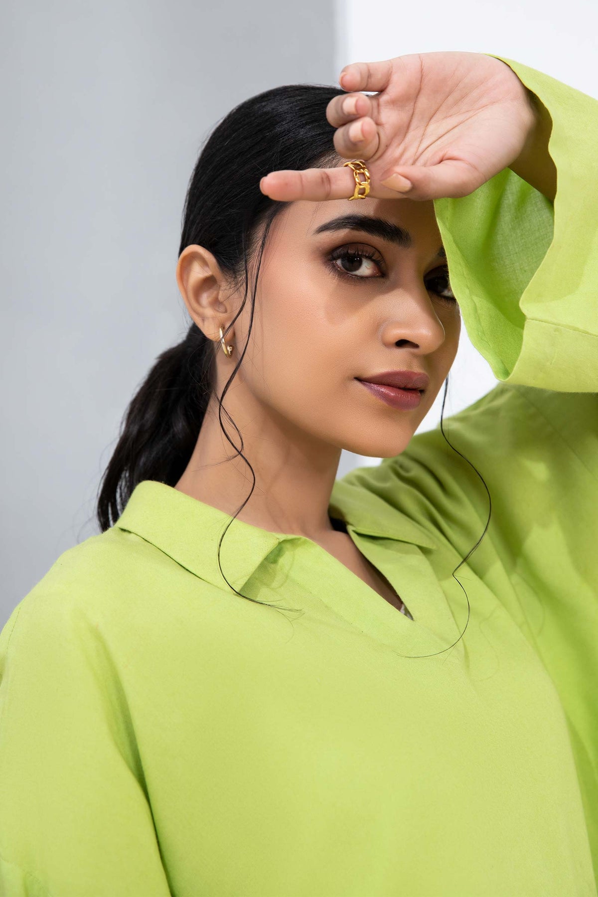 Women's lime green collared tunic with geometric cropped trousers