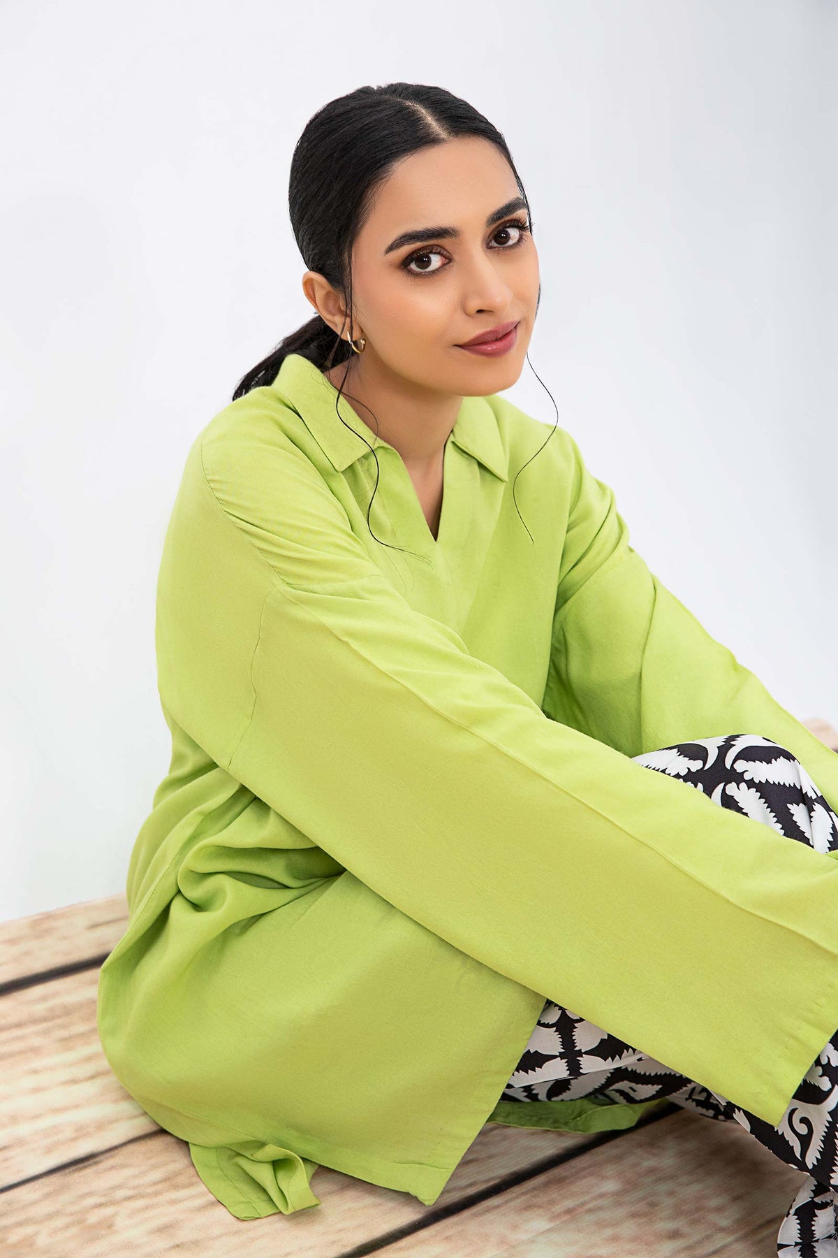 Women's lime green collared tunic with geometric cropped trousers