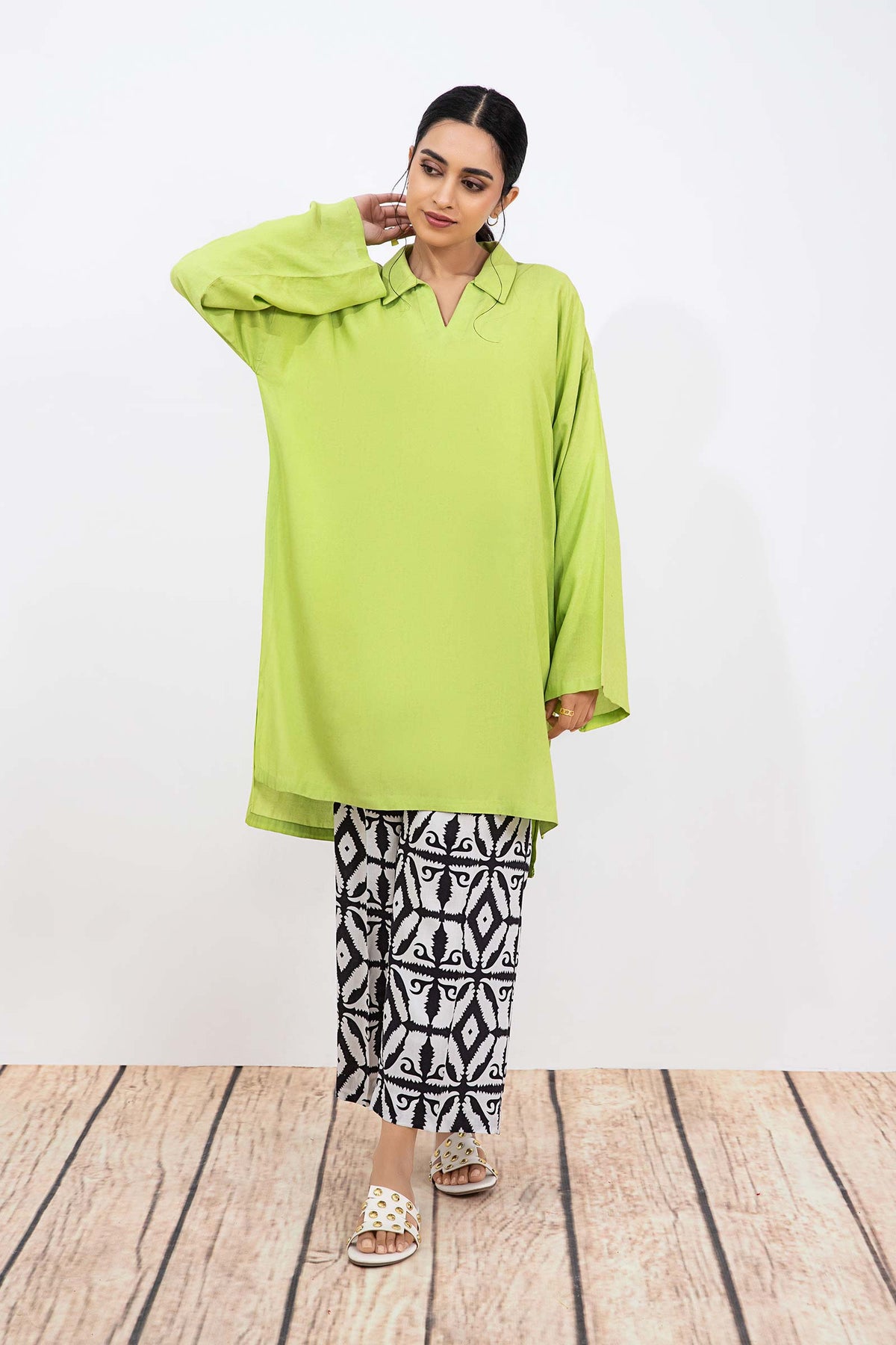 Women's lime green collared tunic with geometric cropped trousers