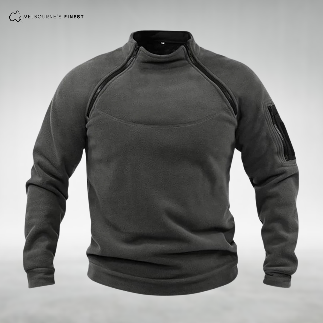 Men's plain fleece pullover with mock neck and zipped chest and sleeve pockets