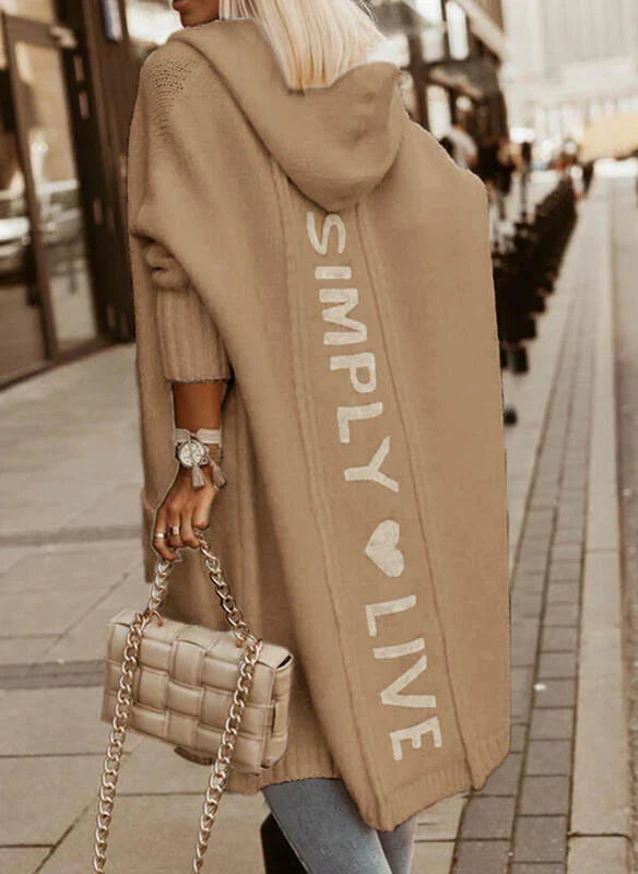 Women's longline hooded knitted cardigan with graphic text on the back