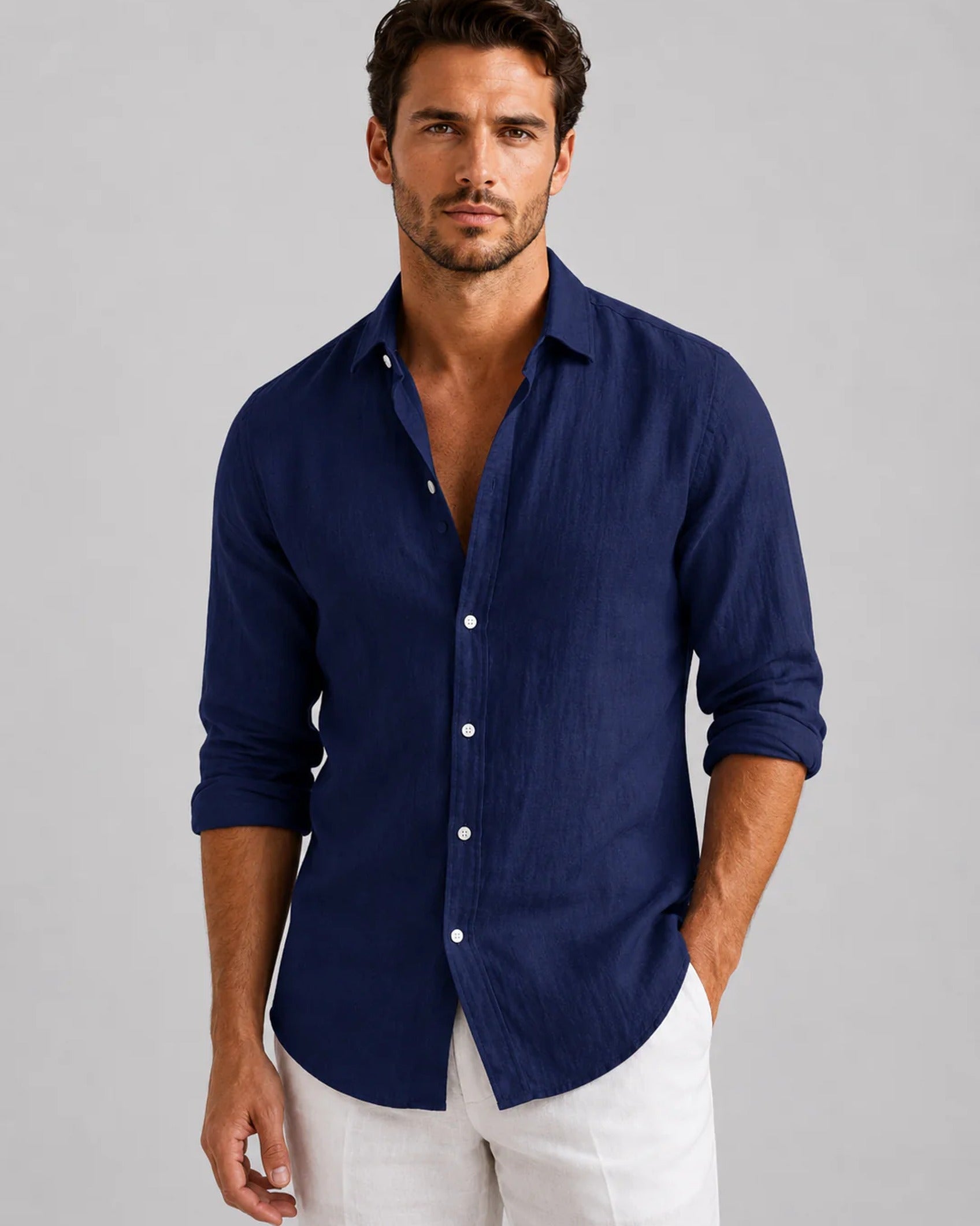 Men's long-sleeve textured button-up shirt with spread collar and curved hem
