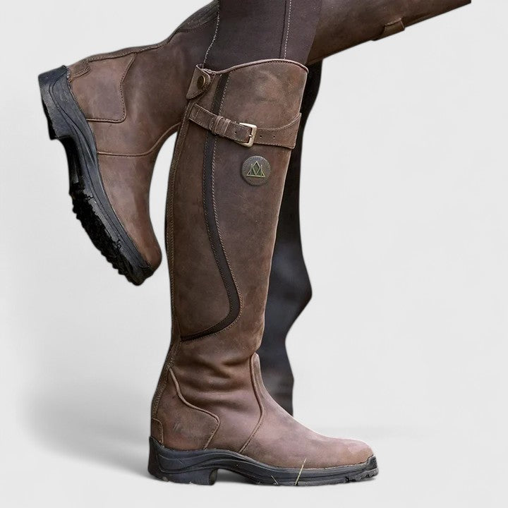Women's knee-high panelled boots with buckle straps and low heels