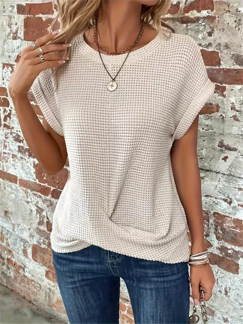 Women's short-sleeve waffle-knit top with a crew neckline and front pocket