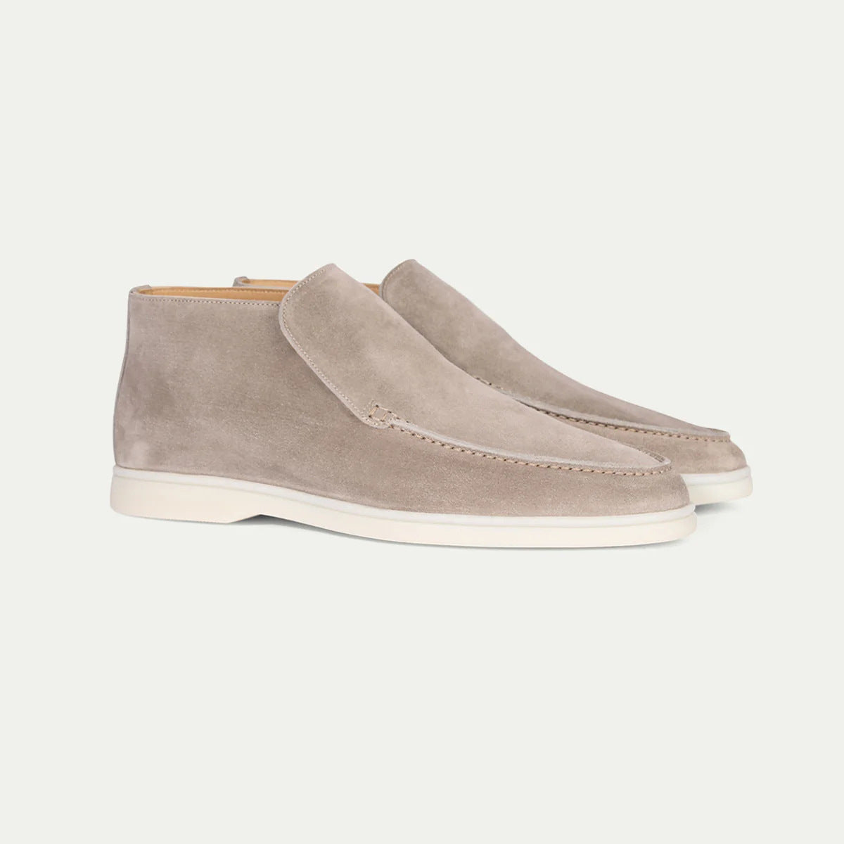 Men's ankle loafer boots with stitched vamp detail and flat light-coloured soles