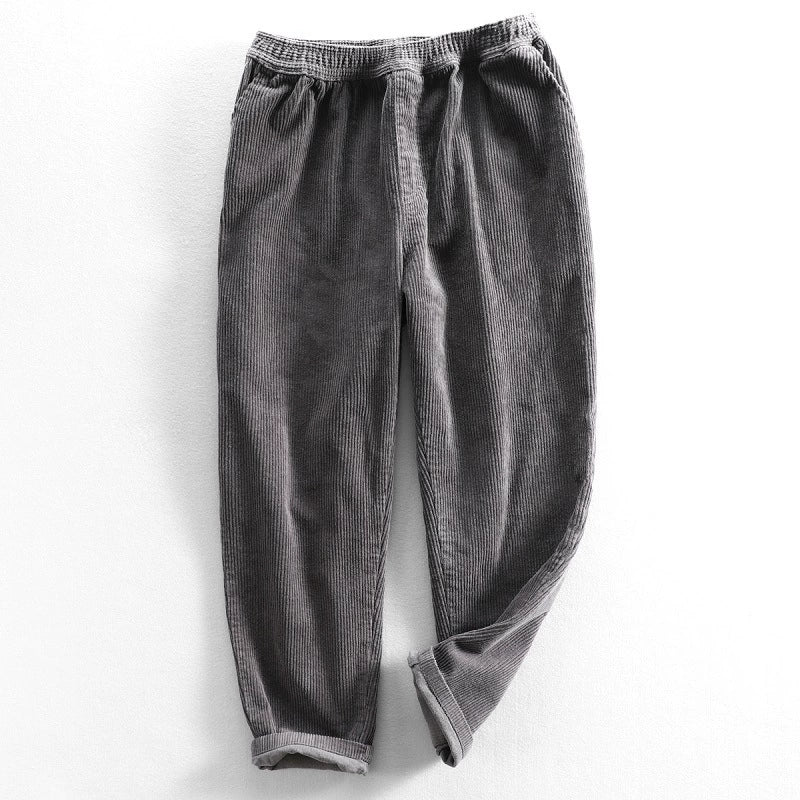 Men's tapered corduroy trousers with elasticated waist and turned-up cuffs