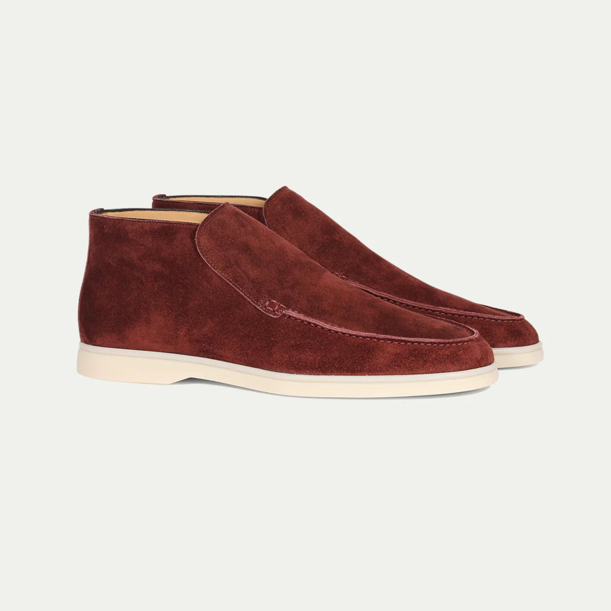 Men's ankle loafer boots with stitched vamp detail and flat light-coloured soles