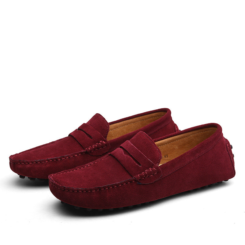 Men's slip-on loafers with moc toe stitching and penny strap detail