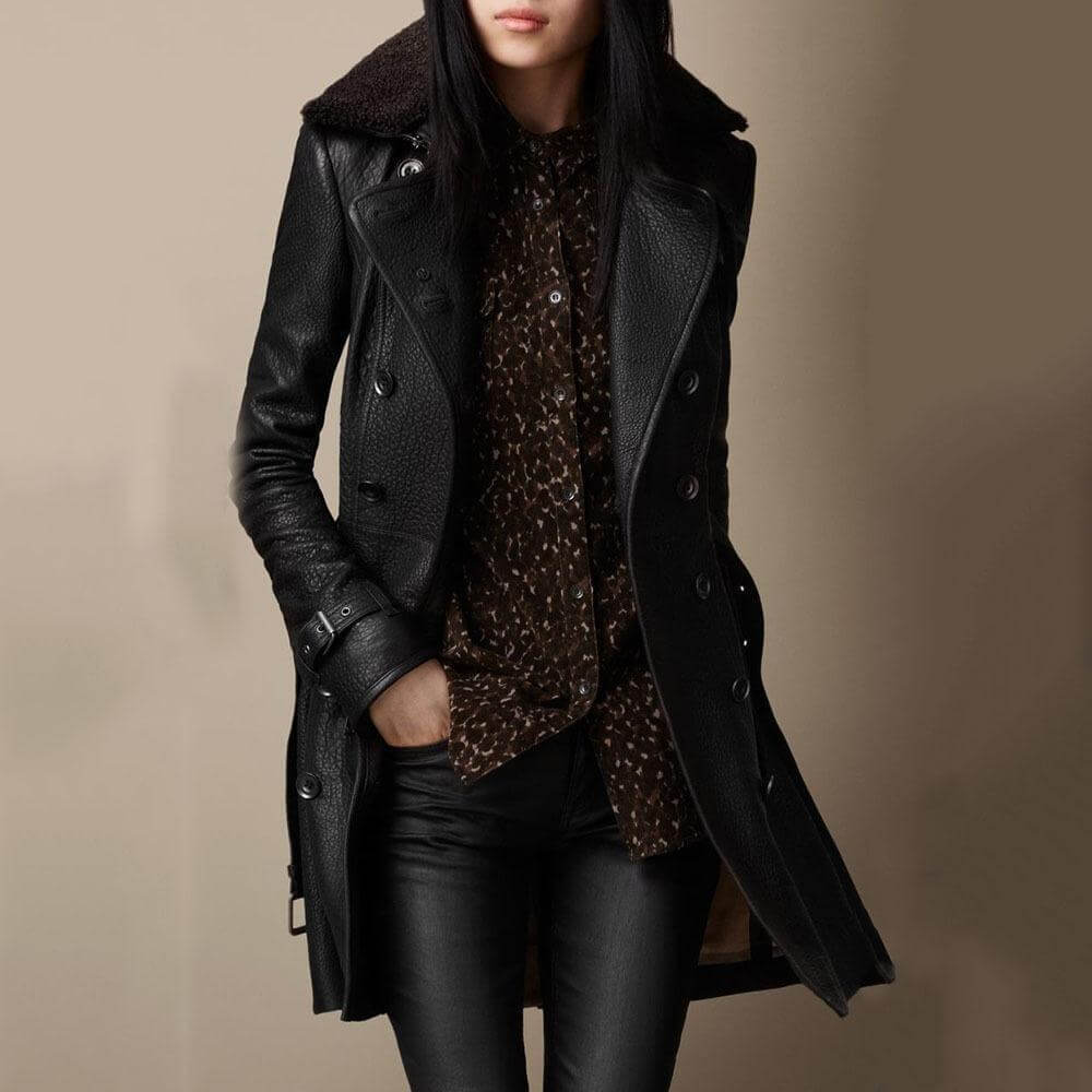 Women's black textured double-breasted long coat with wide lapels and cuff straps