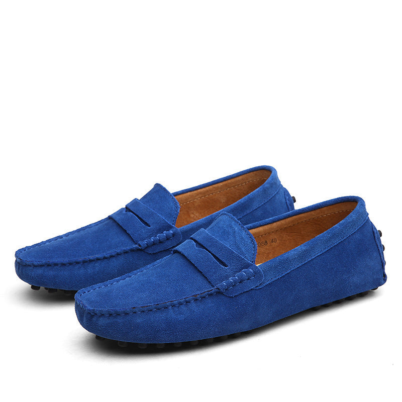 Men's slip-on loafers with moc toe stitching and penny strap detail