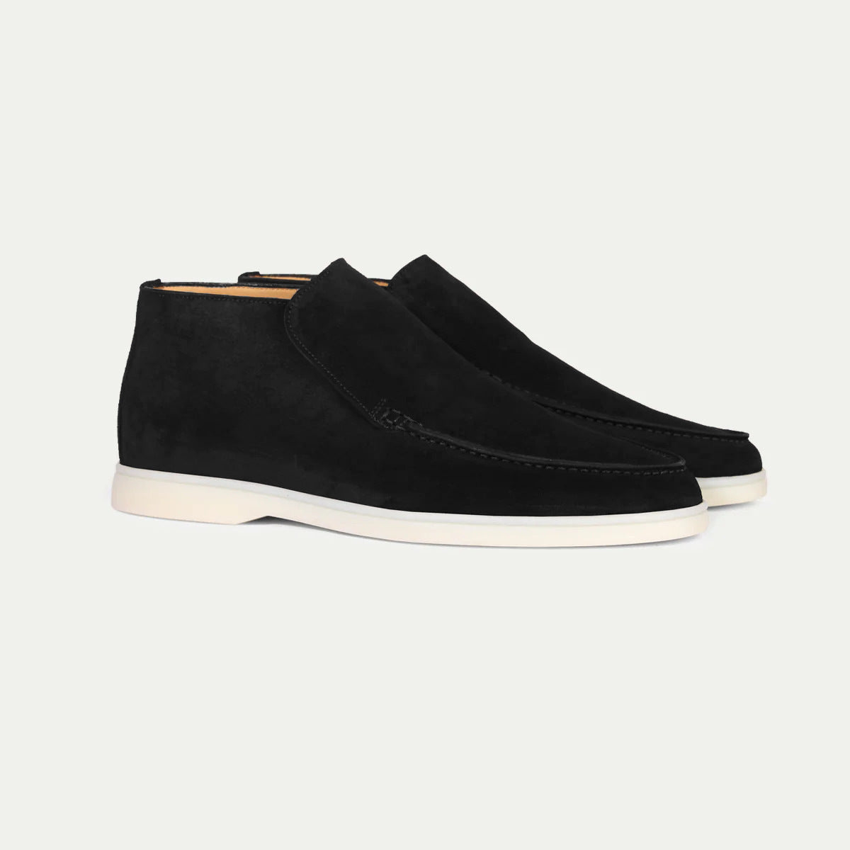 Men's ankle loafer boots with stitched vamp detail and flat light-coloured soles