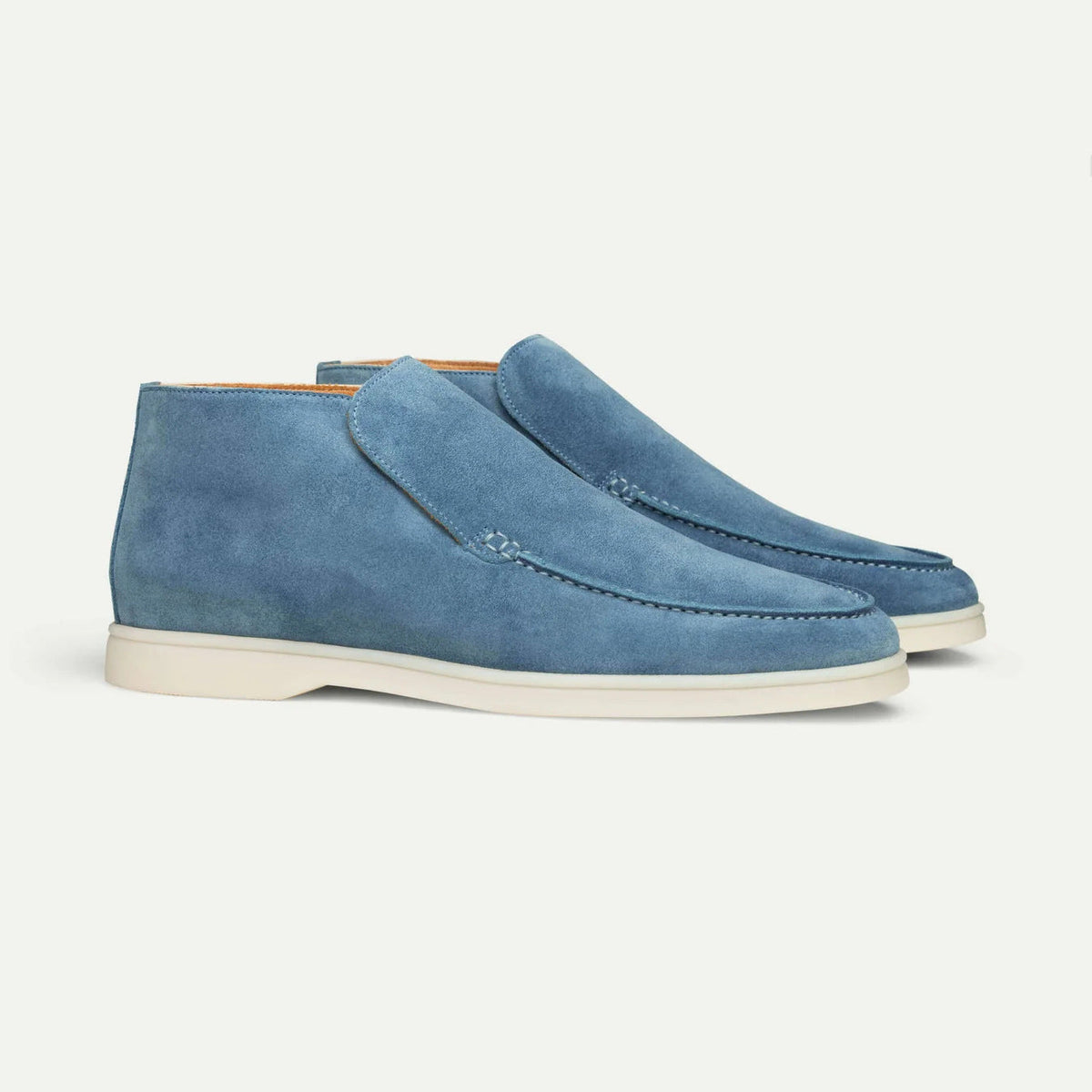 Men's ankle loafer boots with stitched vamp detail and flat light-coloured soles