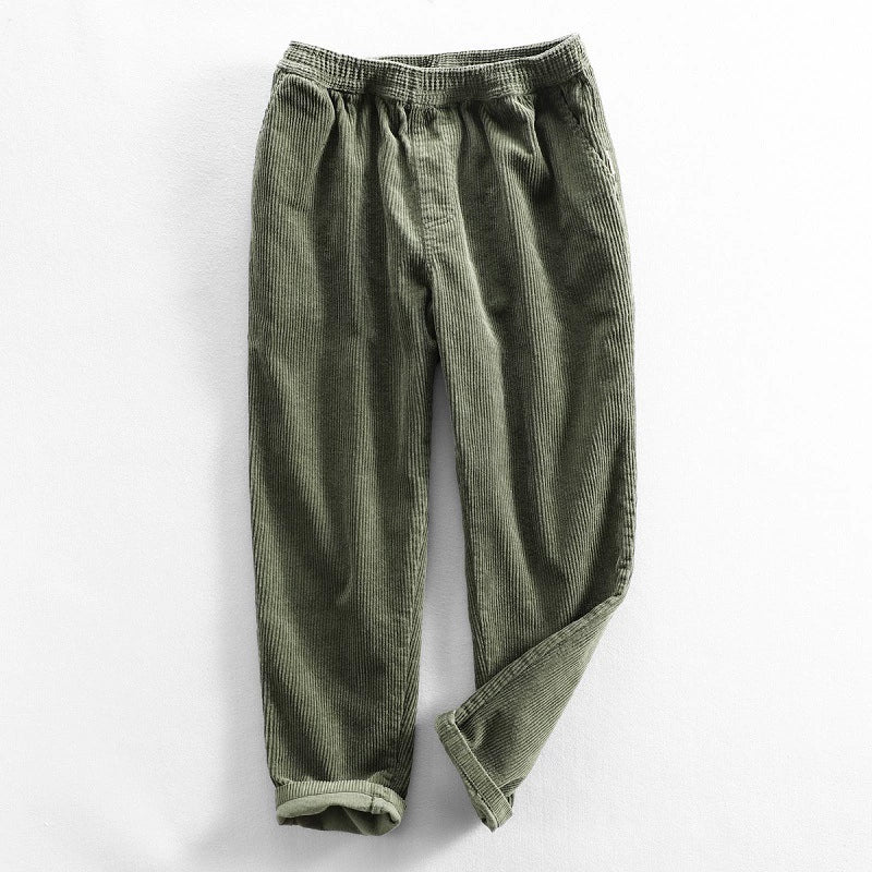 Men's tapered corduroy trousers with elasticated waist and turned-up cuffs