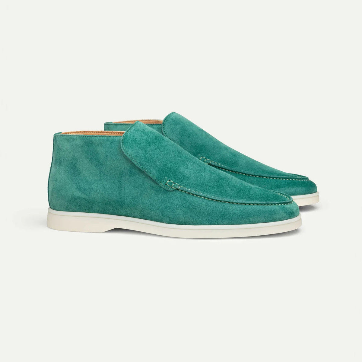Men's ankle loafer boots with stitched vamp detail and flat light-coloured soles