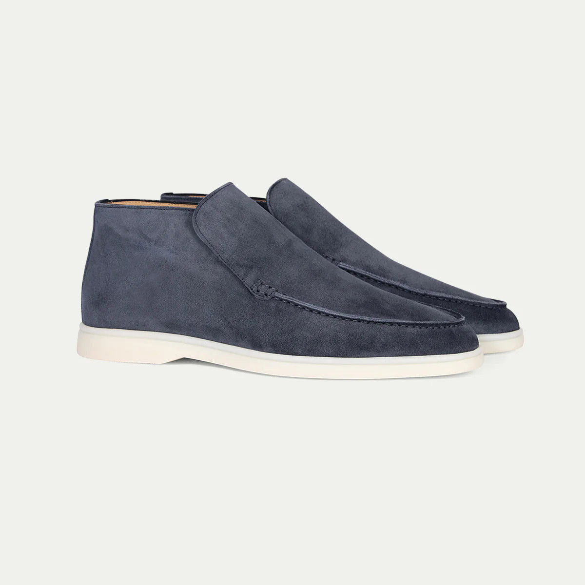 Men's ankle loafer boots with stitched vamp detail and flat light-coloured soles