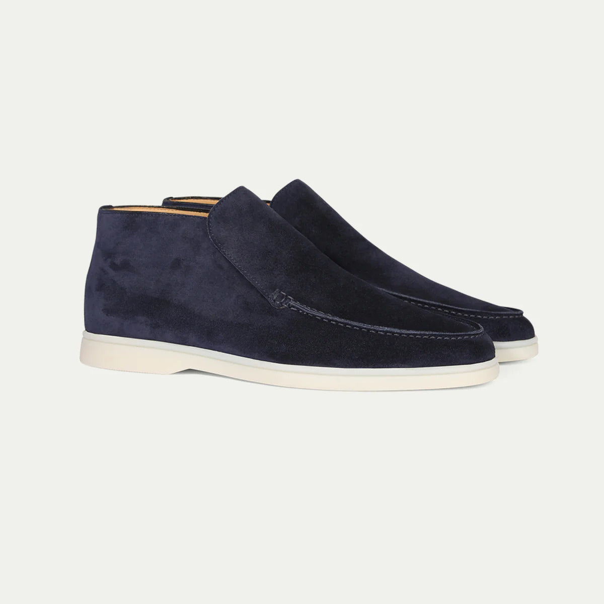Men's ankle loafer boots with stitched vamp detail and flat light-coloured soles