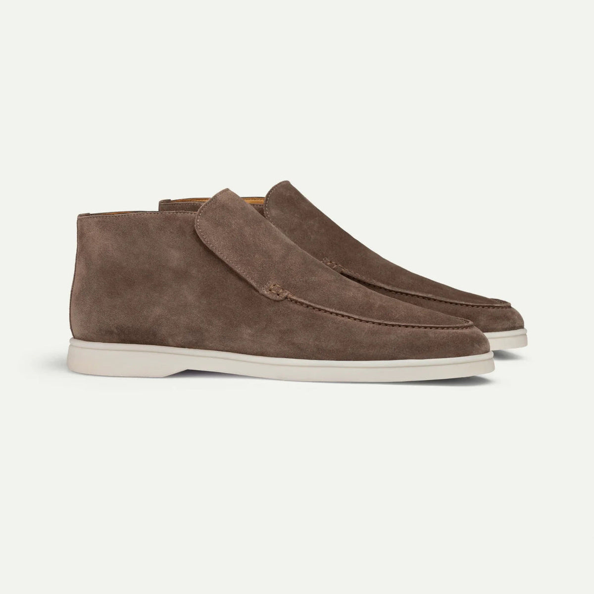 Men's ankle loafer boots with stitched vamp detail and flat light-coloured soles