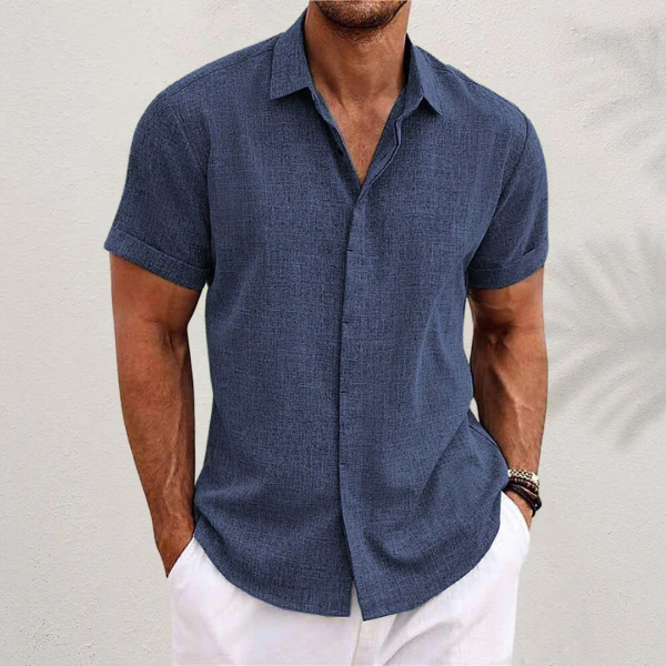 Men's short sleeve collared button shirt with open neckline and curved hem