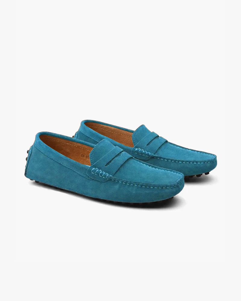 Men's penny loafers with moc toes, stitched trim and low flat soles
