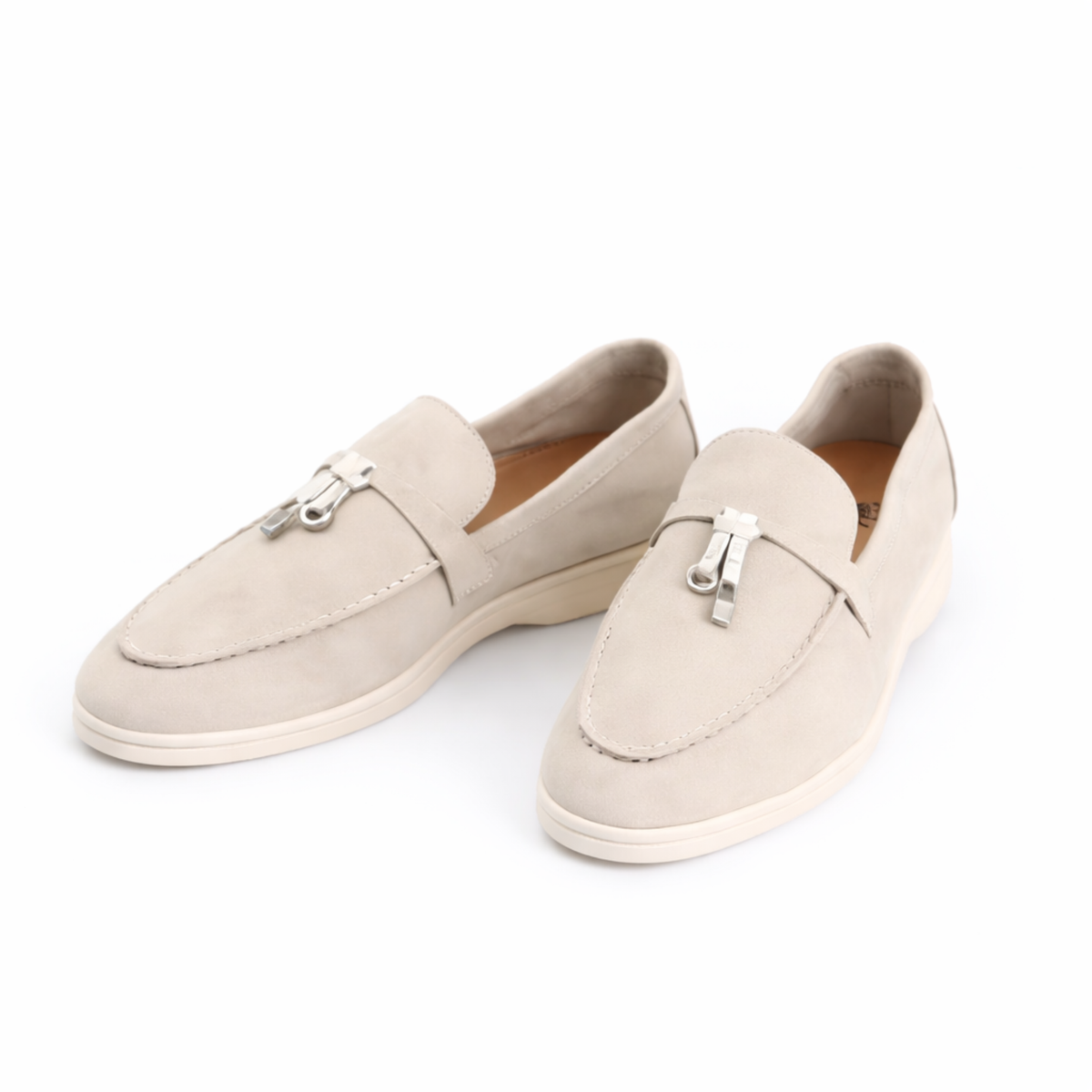 Women's slip-on loafers with metal vamp trim and flat soles