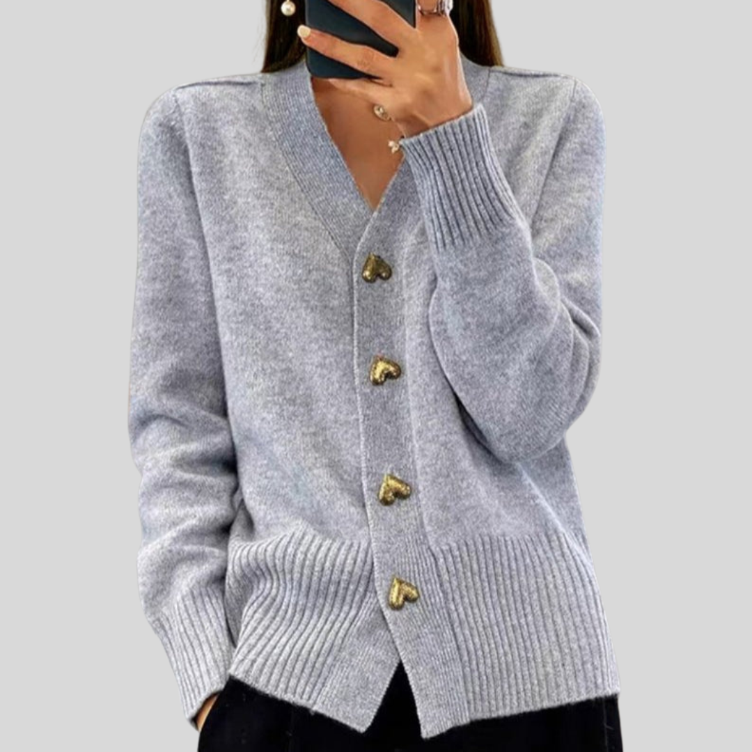 Women's V-neck button front cardigan with long sleeves, front pockets and ribbed trims