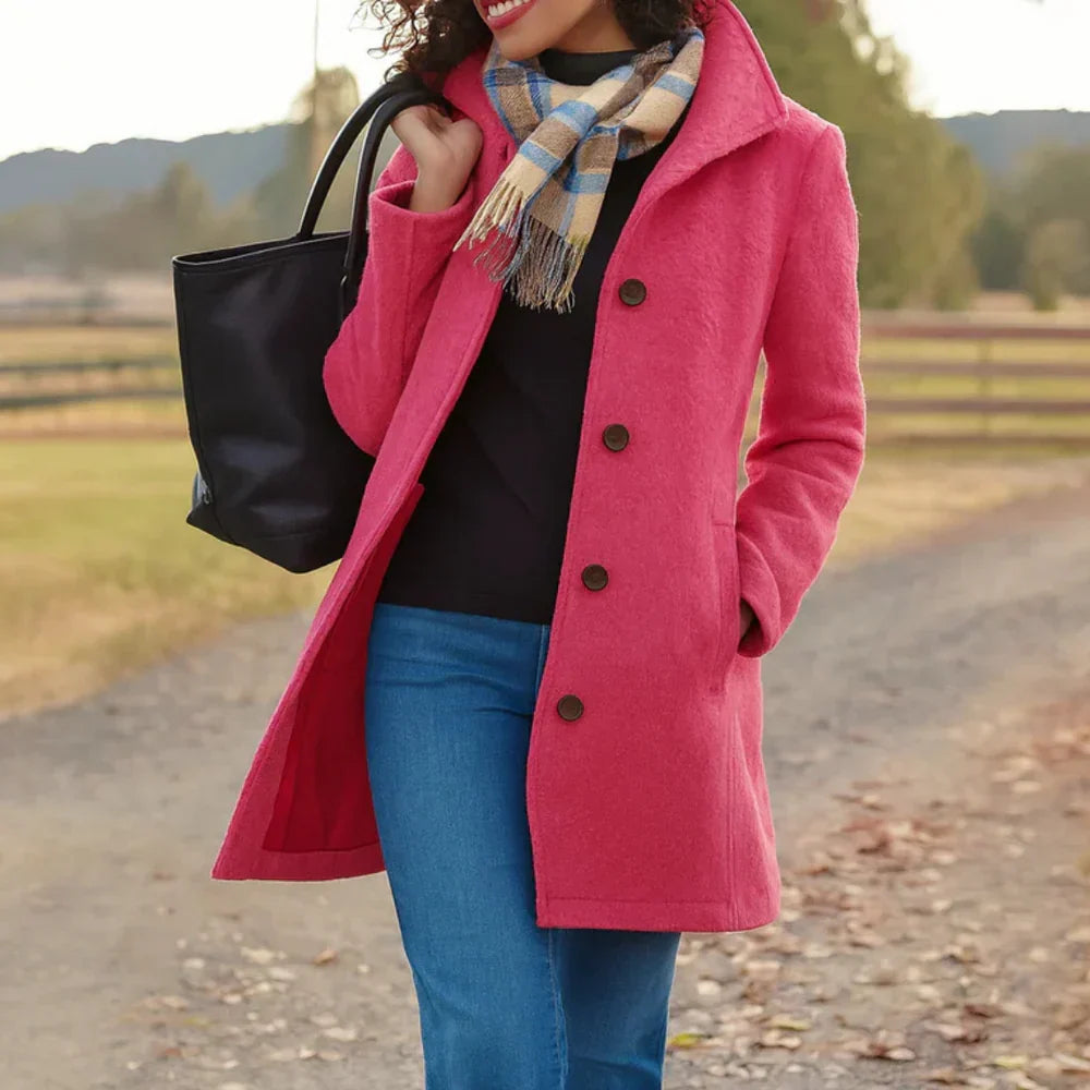 Women's long button-front coat with shirt collar, long sleeves and side pockets