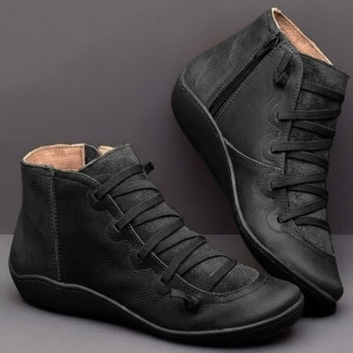 Women's lace-up ankle boots with side zip and raised sole