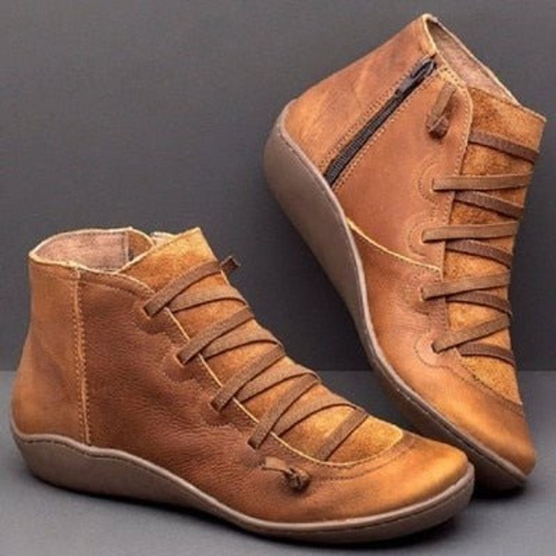 Women's lace-up ankle boots with side zip and raised sole