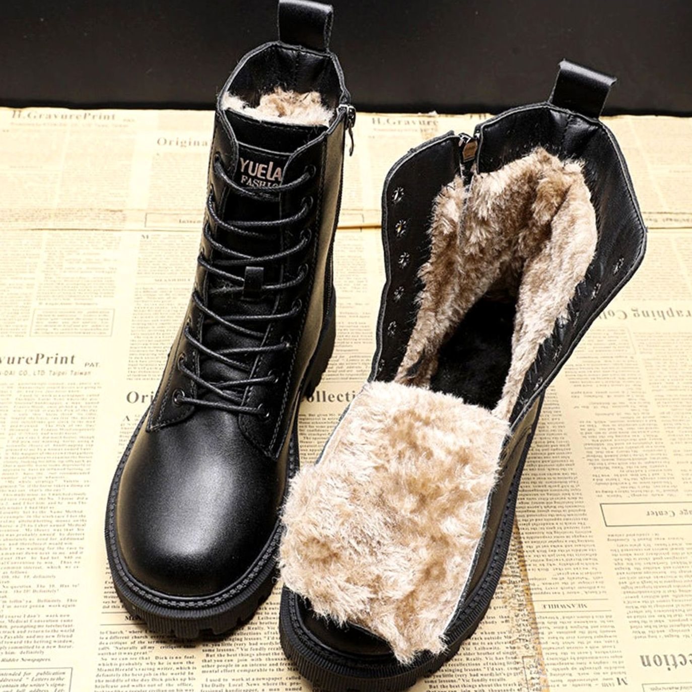 Women's black fur-lined lace-up ankle boots with side zip and flat treaded soles