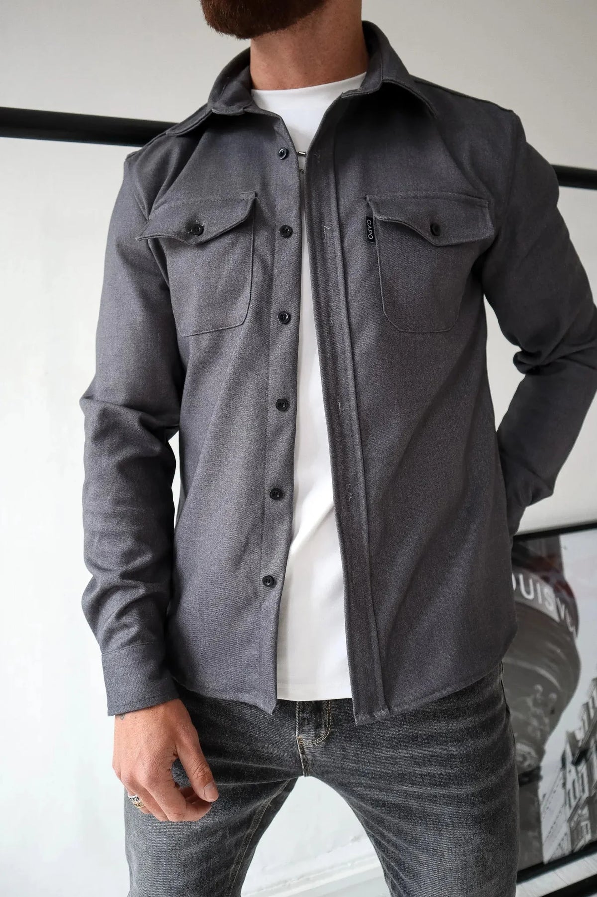 Men's button-up shirt jacket with long sleeves and two chest pockets