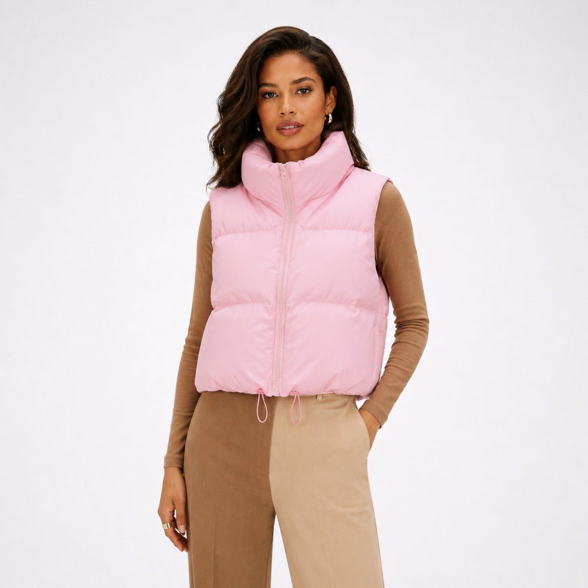 Women's cropped quilted puffer vest with high collar and zip front