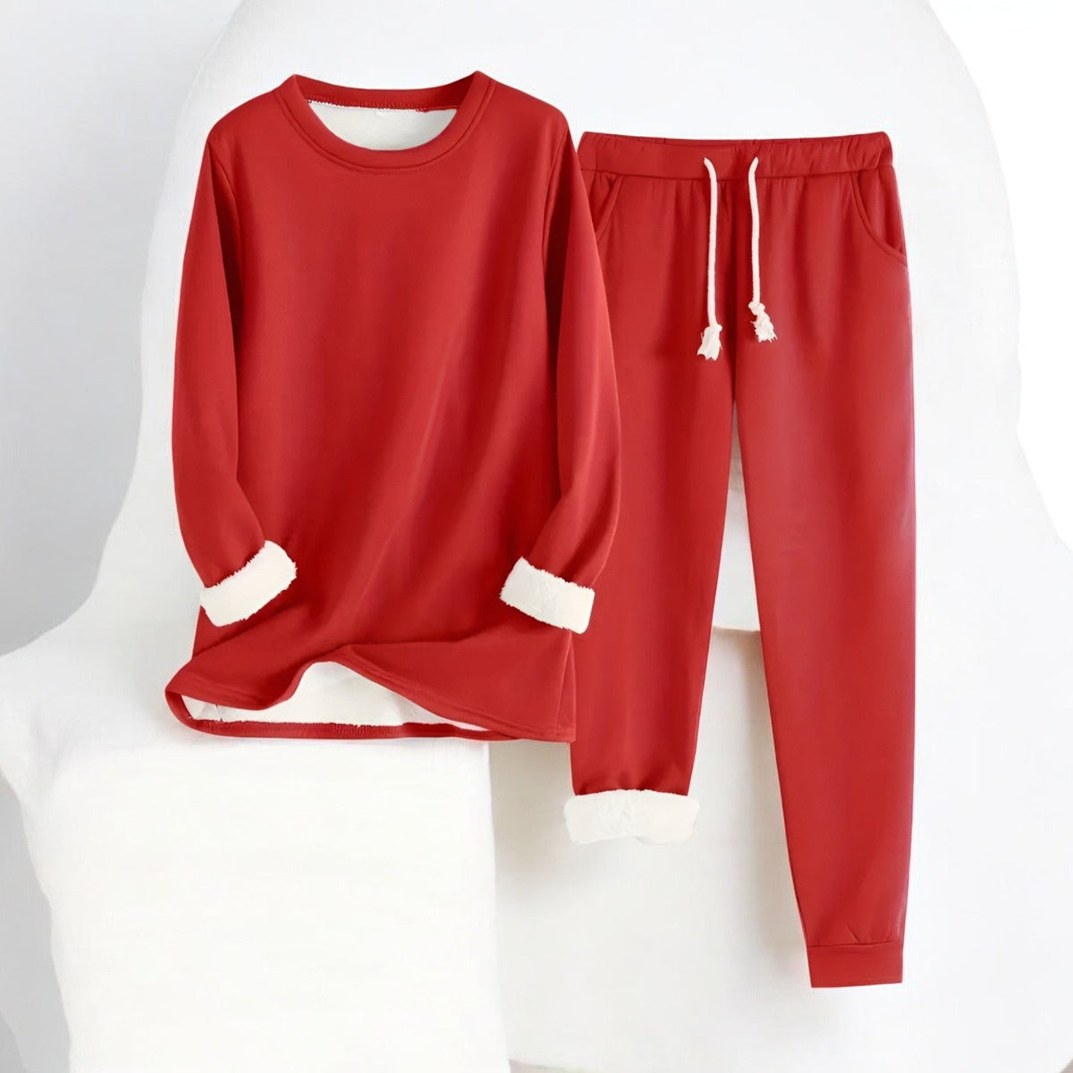 Two-piece crew neck sweatshirt and jogger set with contrasting white cuffs and drawstring trousers