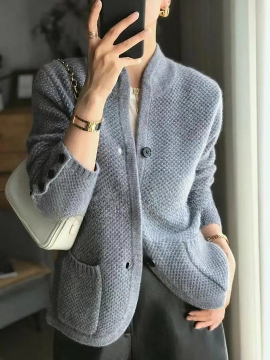 Women's textured knit jacket with stand collar, buttons and patch pockets