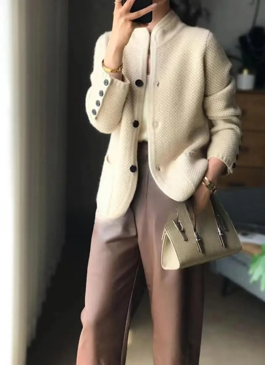 Women's textured knit jacket with stand collar, buttons and patch pockets