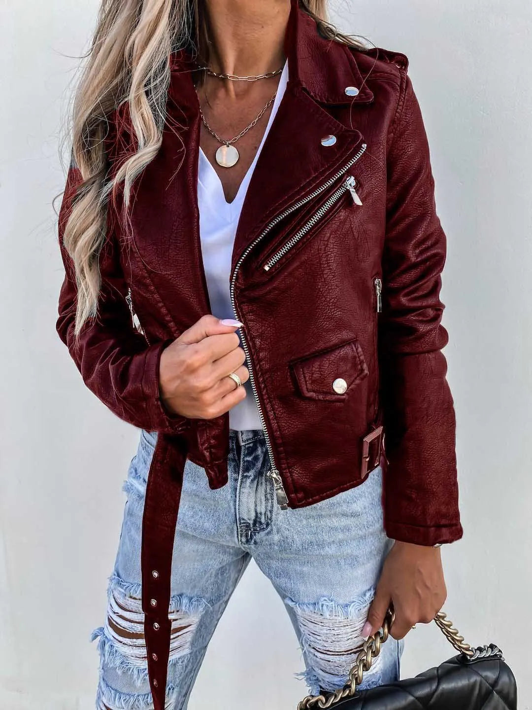 Women's cropped biker jacket with asymmetric zip, long sleeves and belted waist