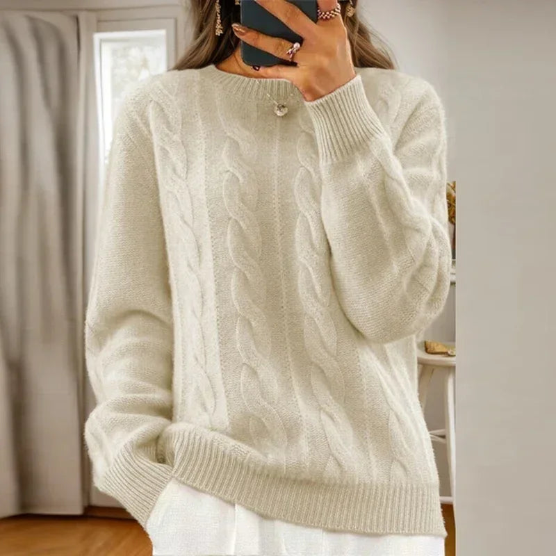 Women's cable knit jumper with crew neckline and ribbed trims